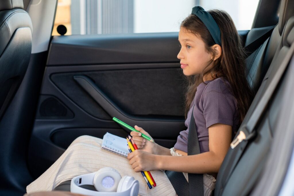 What are road trip essentials for kids for a long car ride?